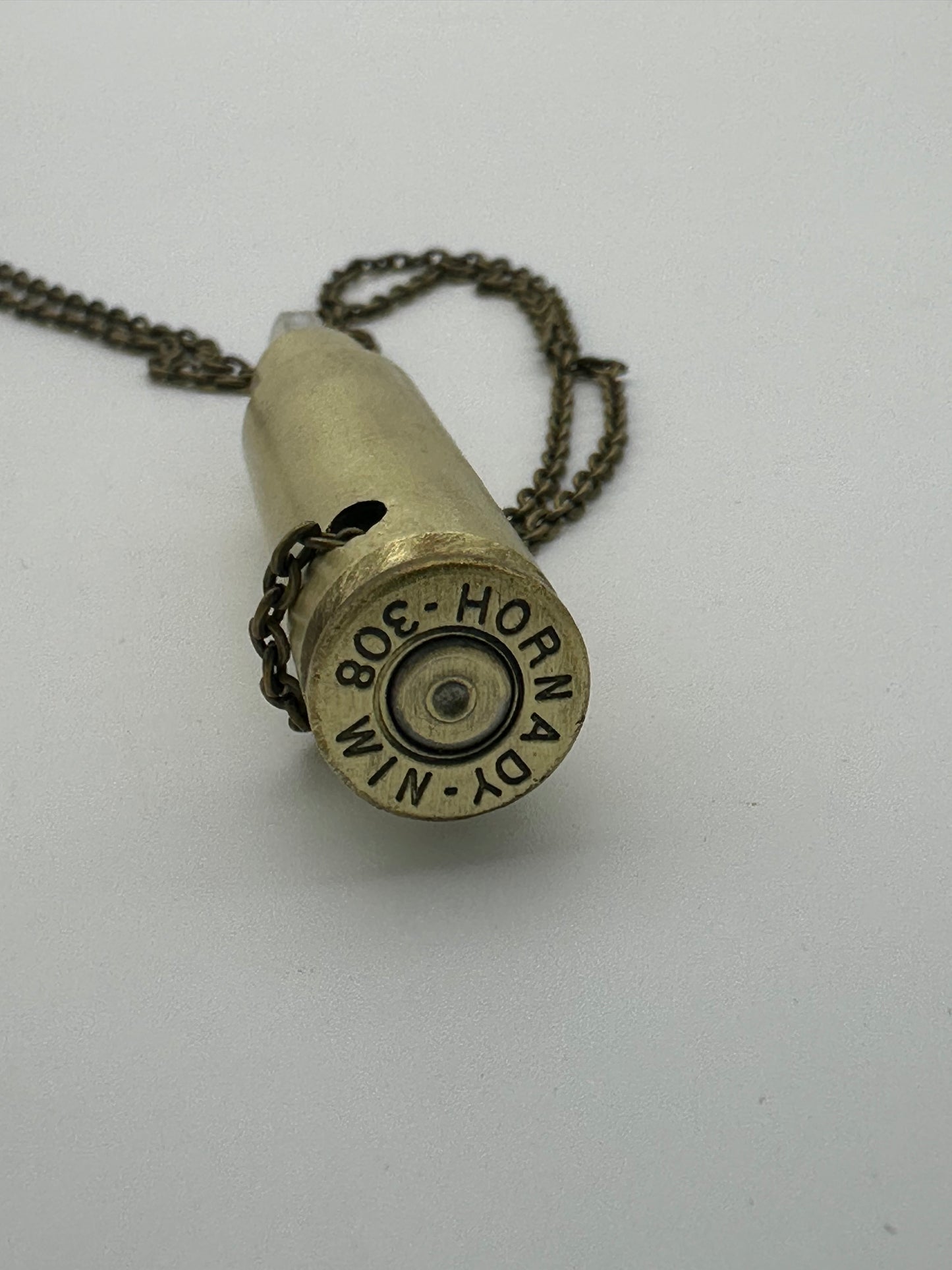 Resilience, a Crystal & Casings Pendant