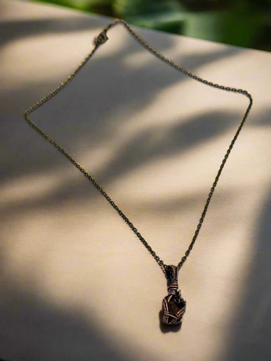 Necklace with a unique clasp on a light gray background