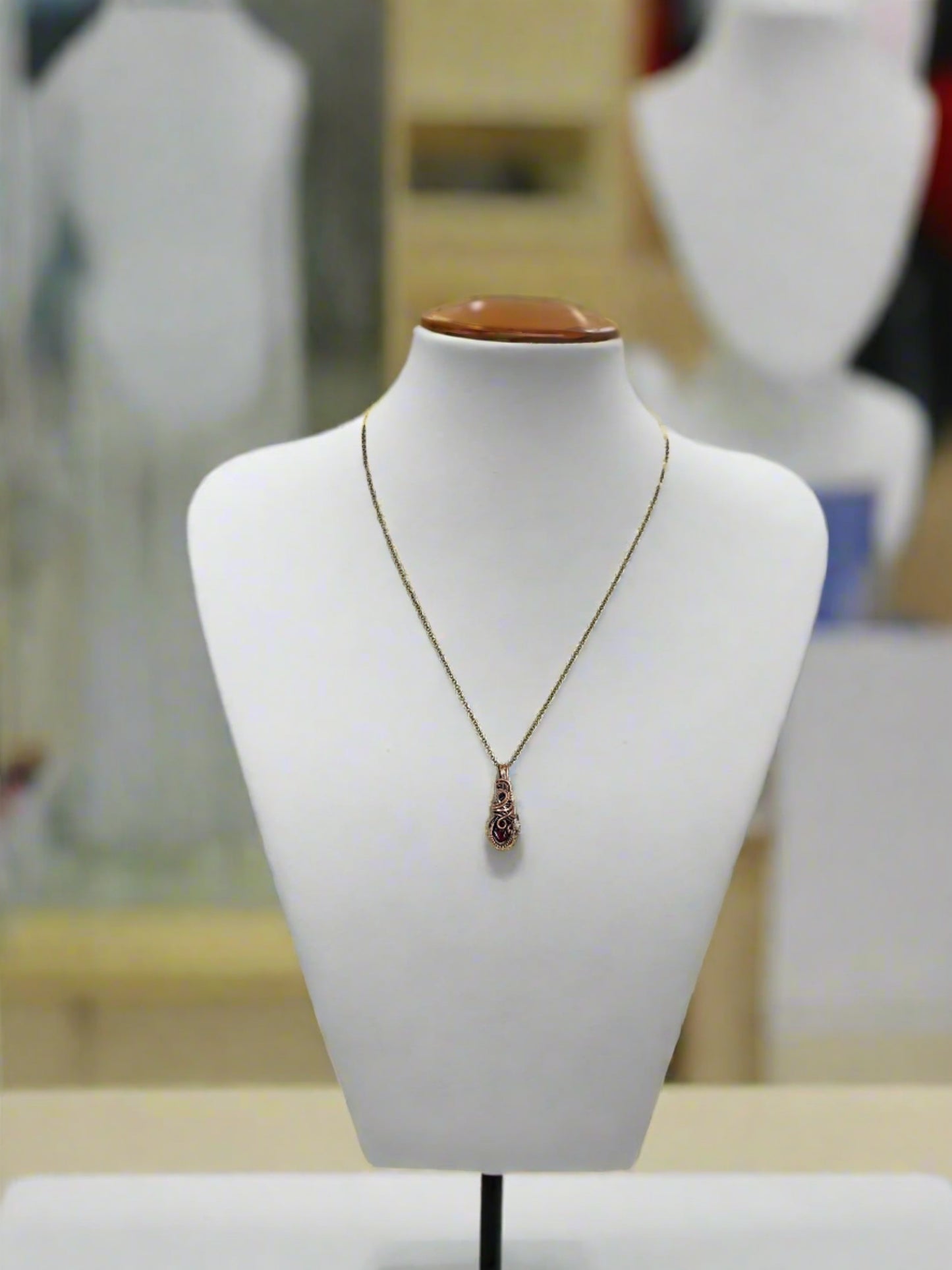 garnet necklace on display