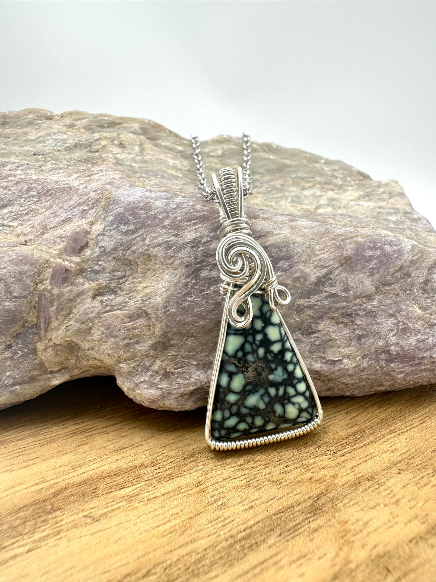 Hand-wrapped spiderweb variscite pendant in .925 sterling silver on 16 inch steel chain — front view