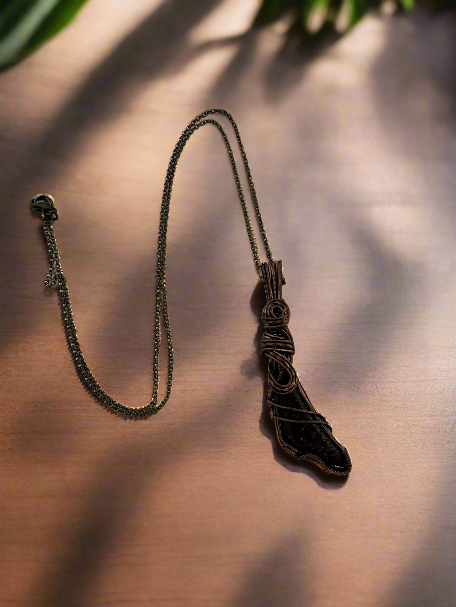 shop dinosaur bone necklace