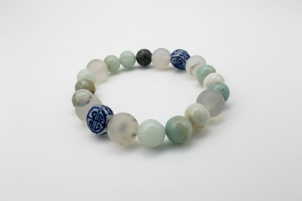 Beaded bracelet with multicolored beads on a white background