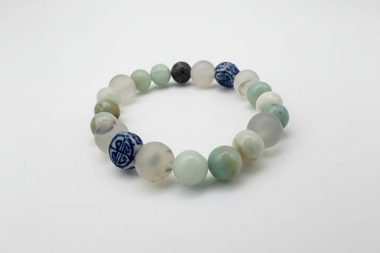 Beaded bracelet with multicolored beads on a white background