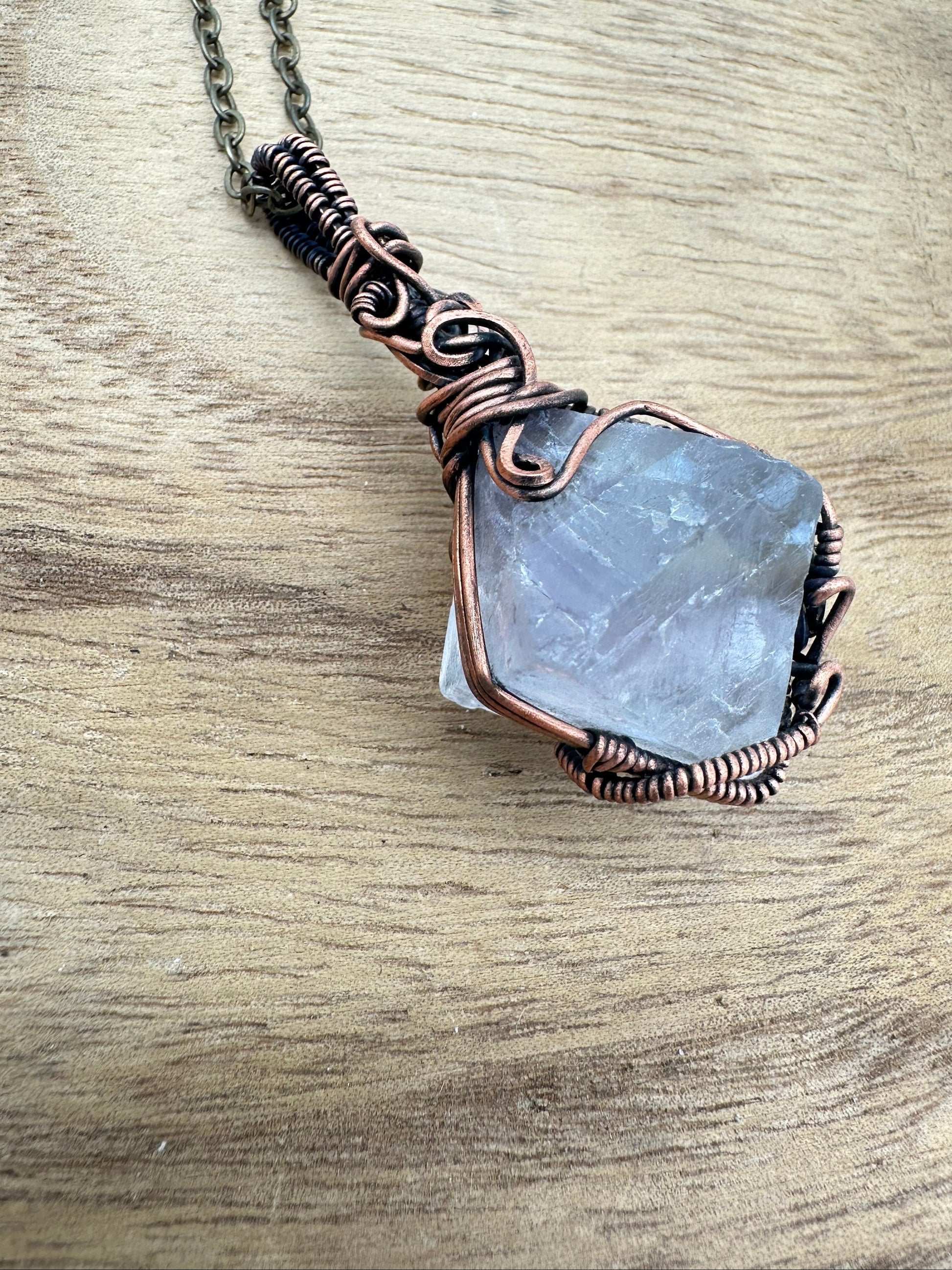Close up of Fluorite Octahedron Pendant