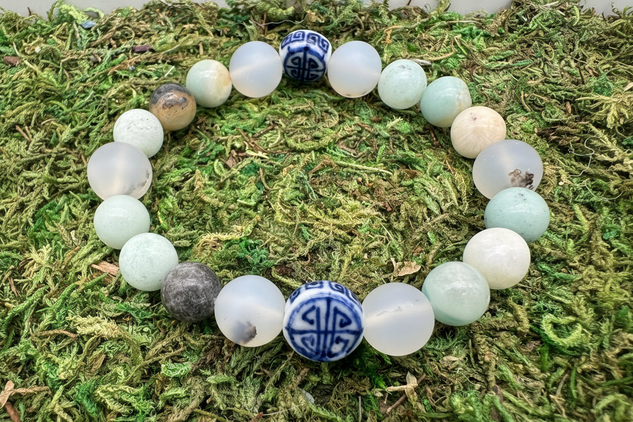 Bracelet with multicolored beads on a moss background