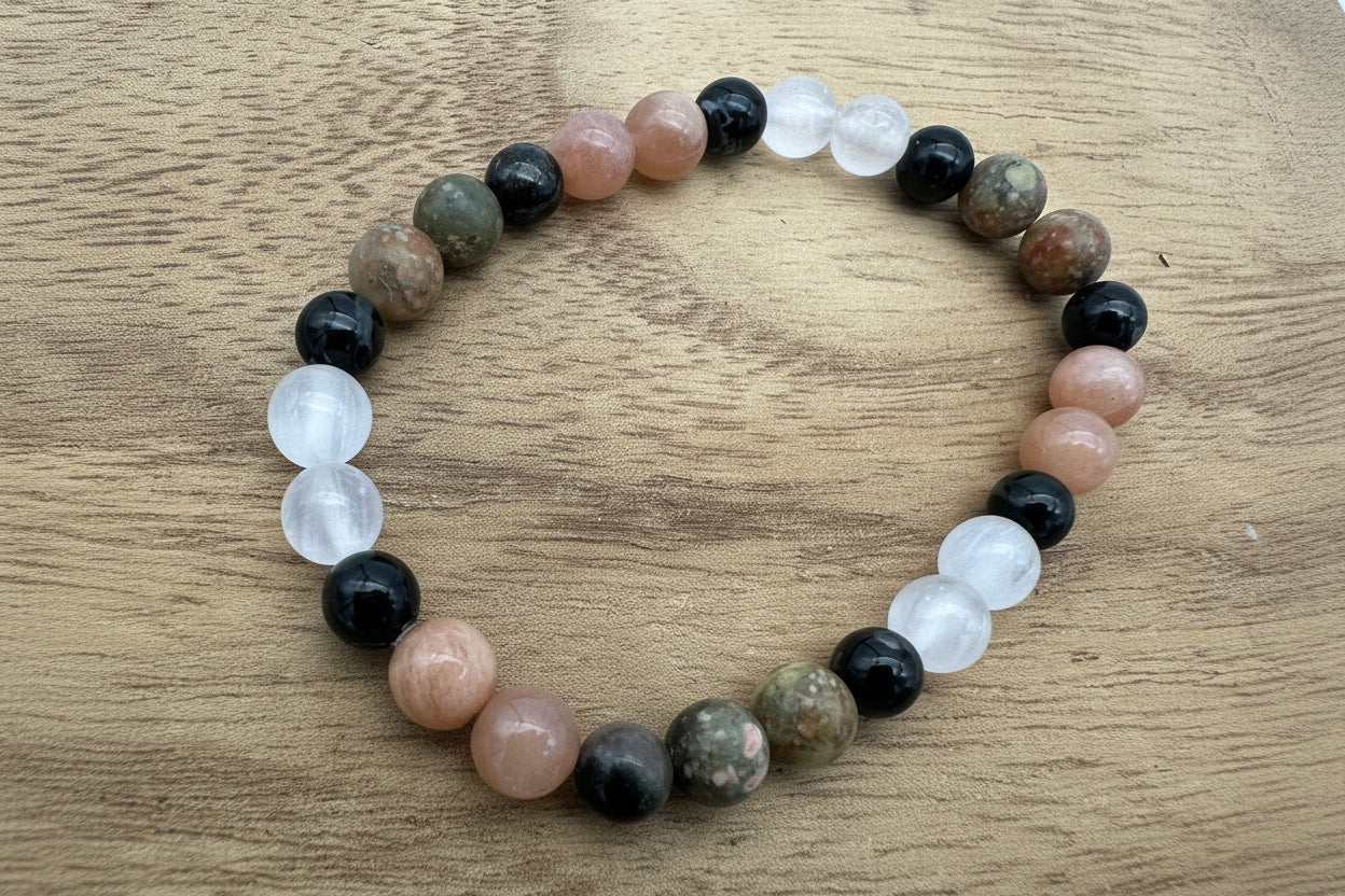 Multicolored beaded bracelet on a wooden surface