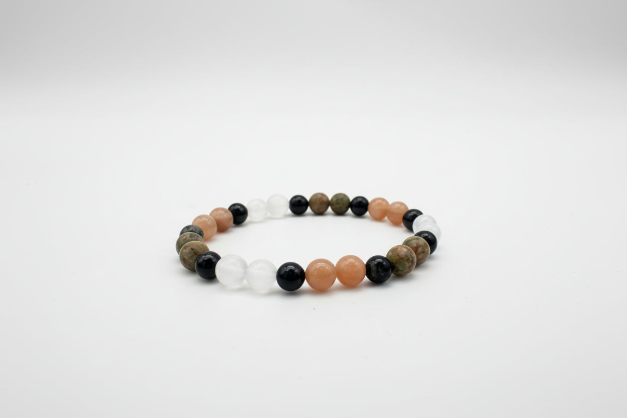 Multicolored beaded bracelet on a white background